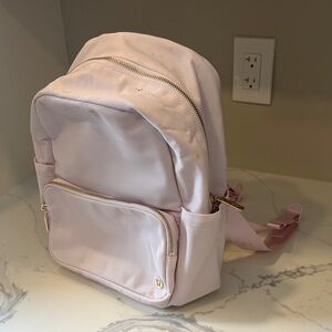 Lululemon Blissful Pink Backpack with Gold Accents